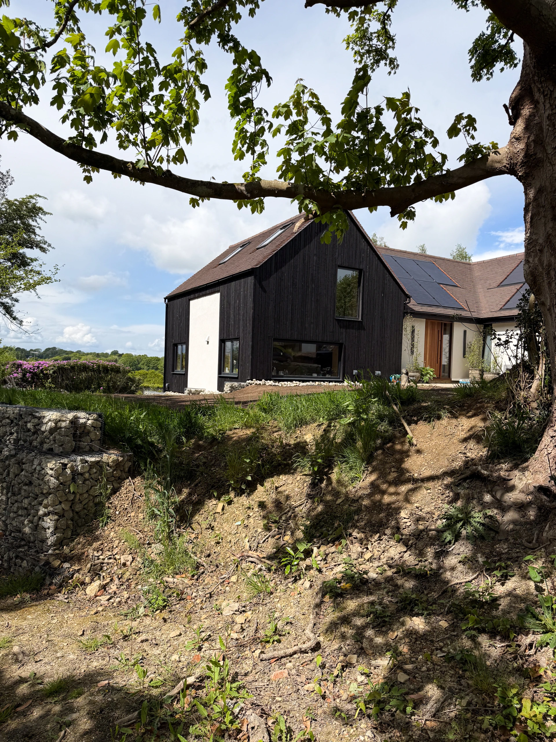 KAEN Carbon charred larch exterior cladding at Hillside House Overlooking the Valley in KAEN Larch, East Sussex, UK
