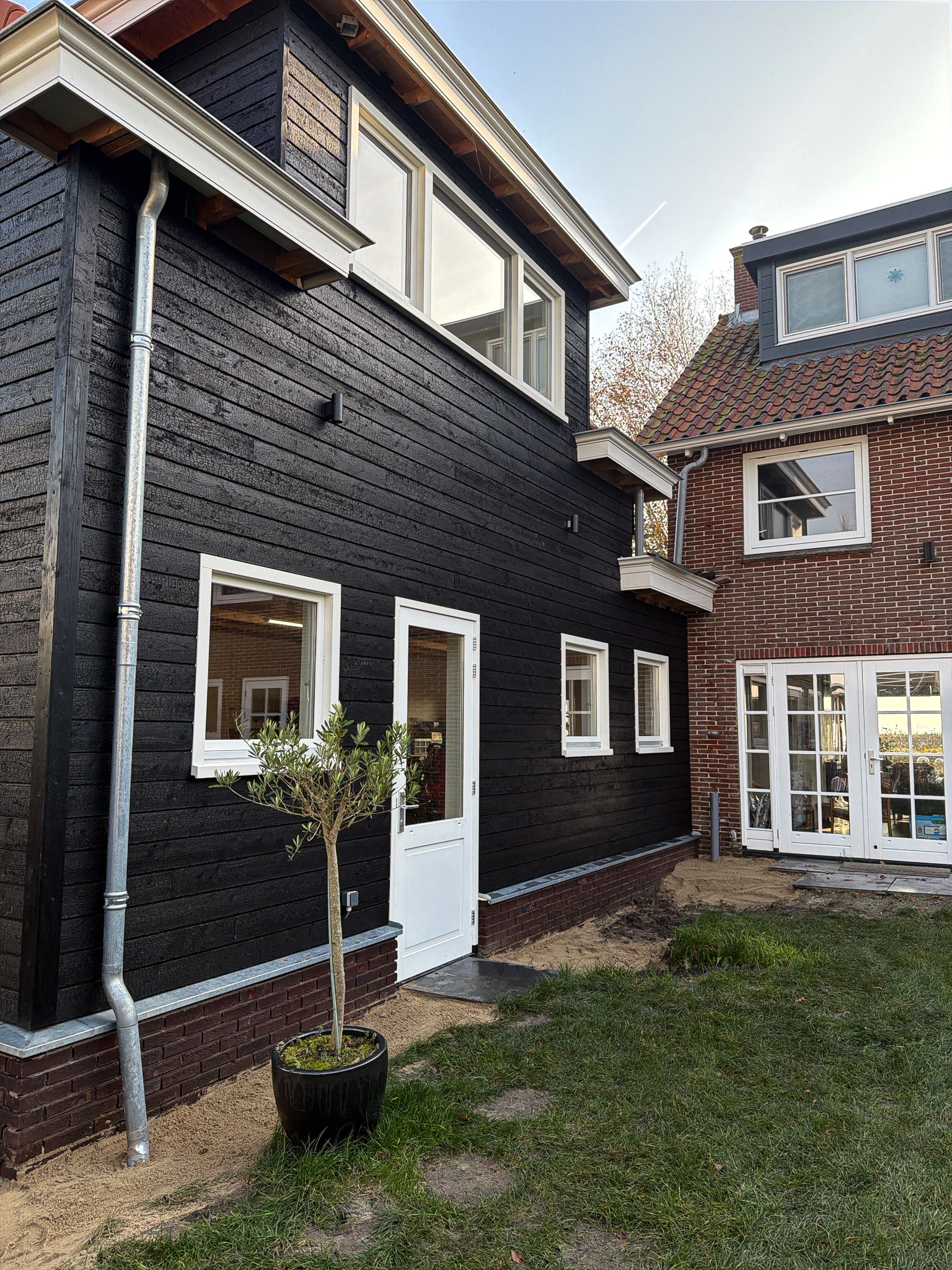 KAEN Carbon charred larch exterior cladding at Gabled Heritage Extension in KAEN Larch, the Netherlands